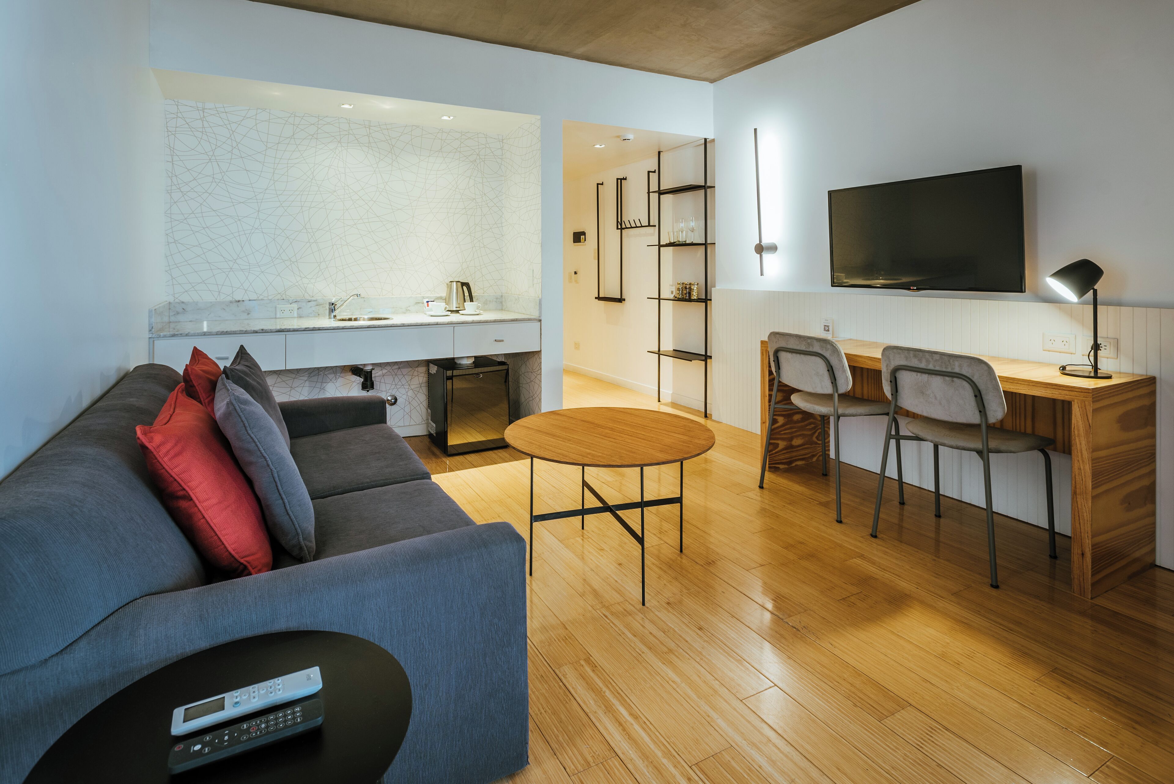 deluxe suite, 1 bedroom, balcony | living area | 42-inch lcd tv with cable channels, tv