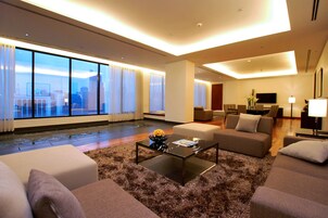 Grand Suite, 1 King Bed | Living area | LED TV