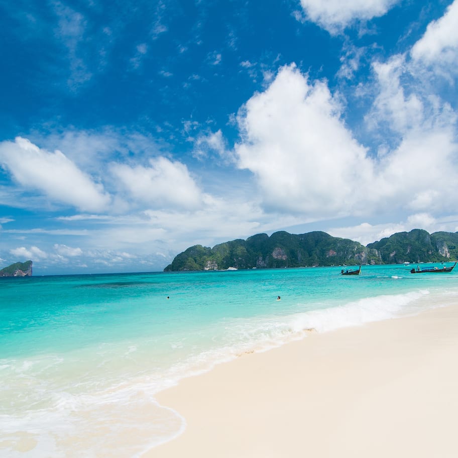 On the beach, sun loungers, beach umbrellas, beach towels