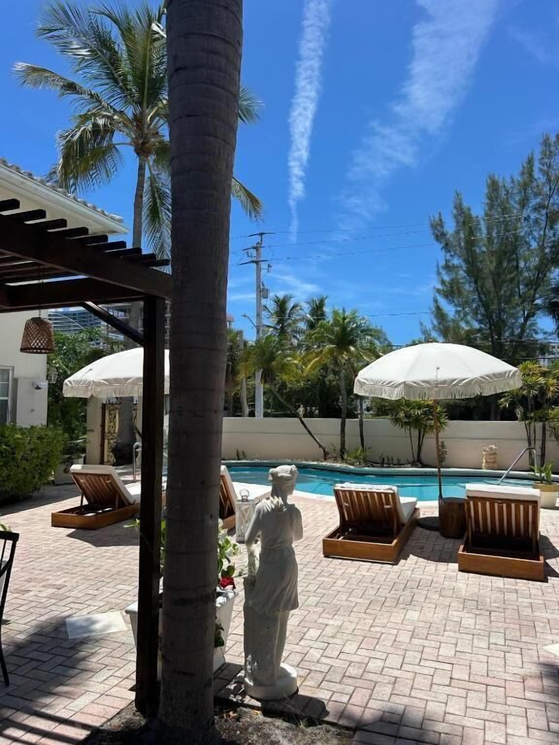 Outdoor pool, pool umbrellas, pool loungers