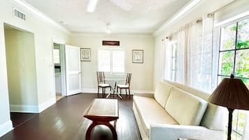 Suite, 1 Bedroom | Living area | 1-inch flat-screen TV with cable channels, TV, streaming services