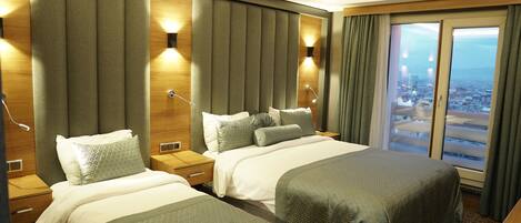 Egyptian cotton sheets, premium bedding, minibar, in-room safe