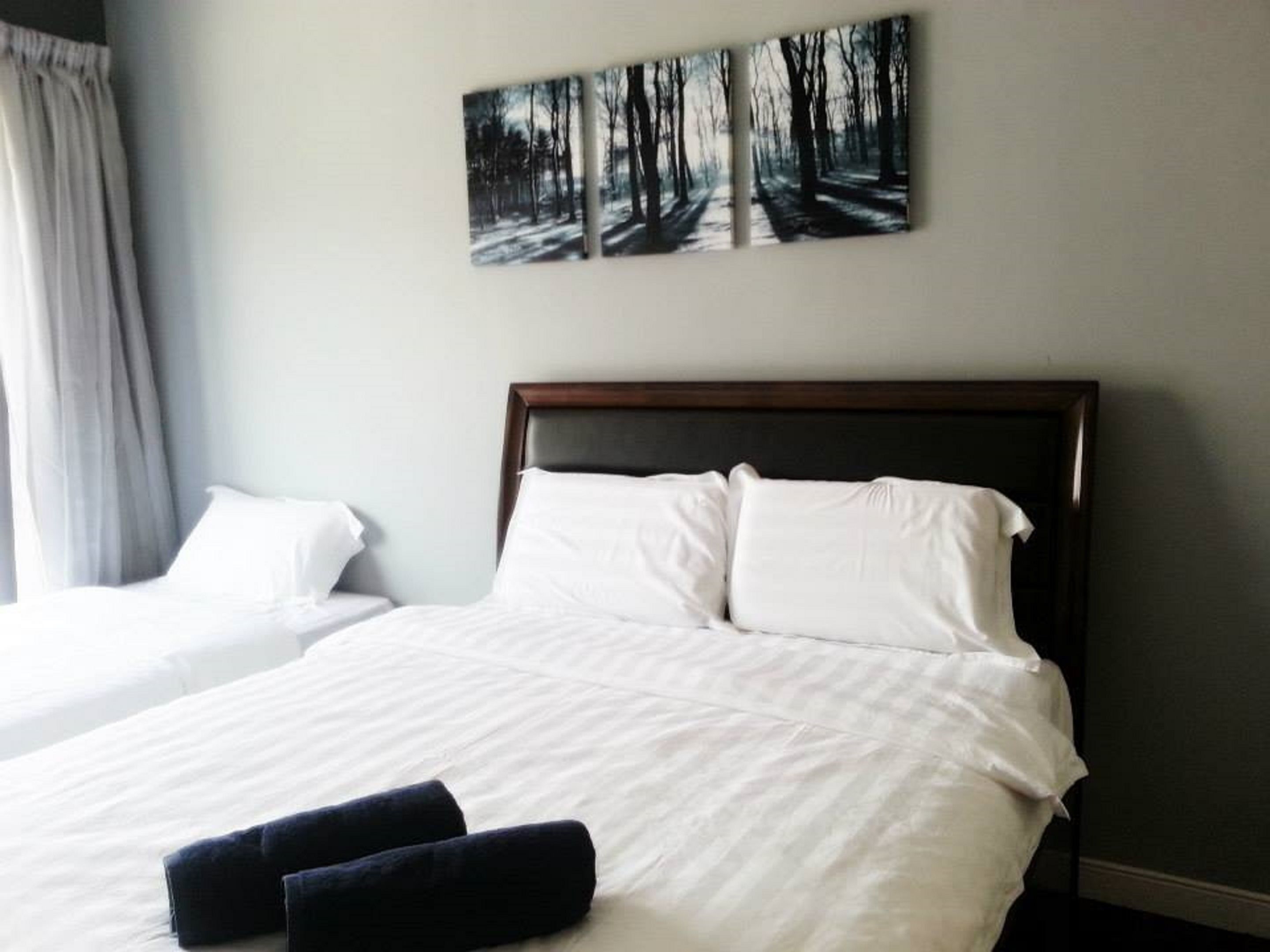 Deluxe Room, 3 Bedrooms | 3 bedrooms, desk, iron/ironing board, cots/infant beds