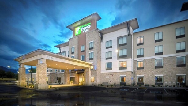 A Holiday Inn Express hotel with a covered entrance and multiple floors.