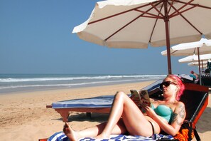 Private beach, white sand, sun-loungers, beach umbrellas