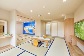 Suite familiar (Japanese, Open-Air Hot Springs, EN) | 1 habitación, edredón y caja de seguridad en la habitación