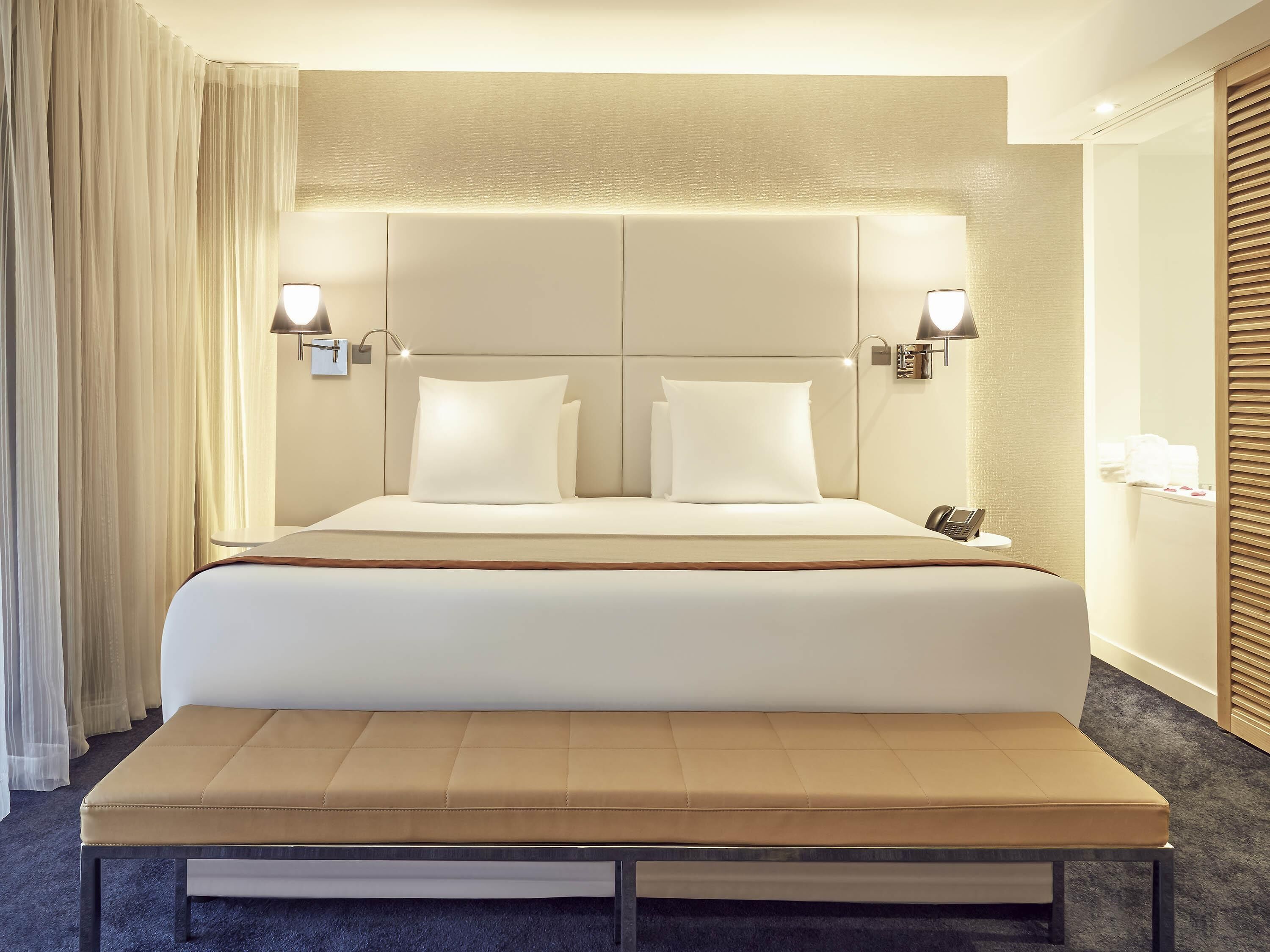 Premium bedding, pillow-top beds, free minibar items, in-room safe
