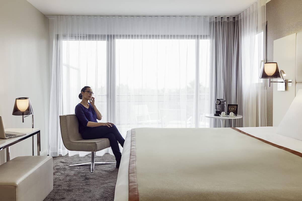 Premium bedding, pillow-top beds, free minibar items, in-room safe