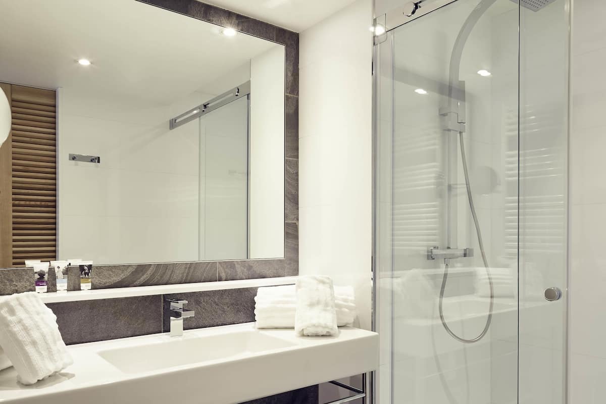 Premium bedding, pillow-top beds, free minibar items, in-room safe