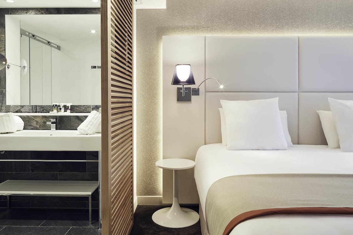 Premium bedding, pillowtop beds, free minibar items, in-room safe