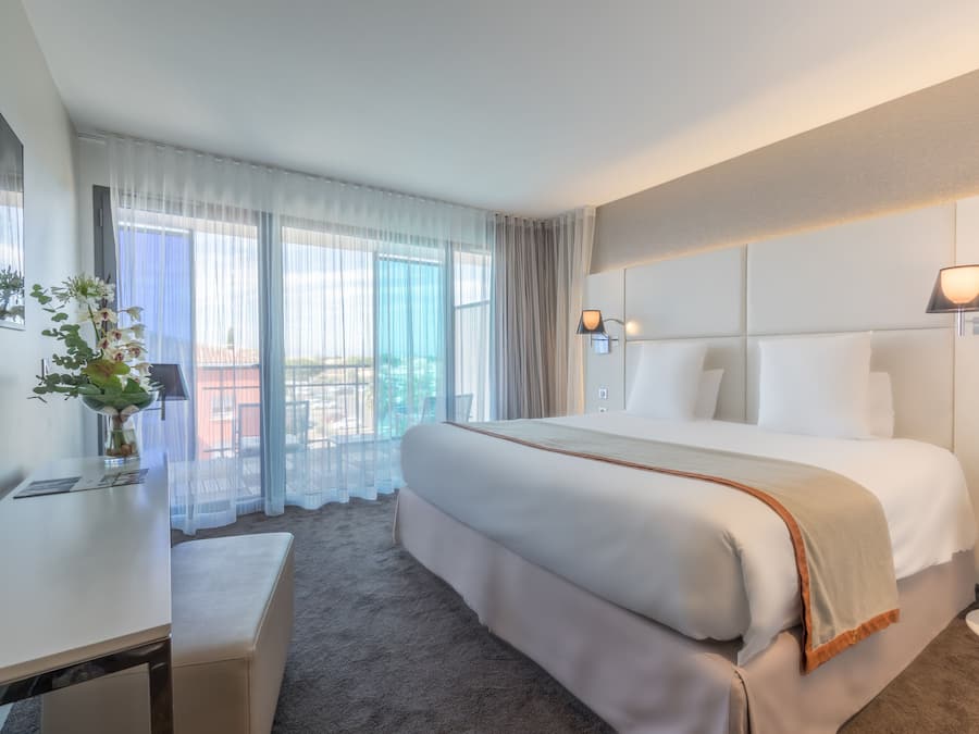 Premium bedding, pillowtop beds, free minibar items, in-room safe