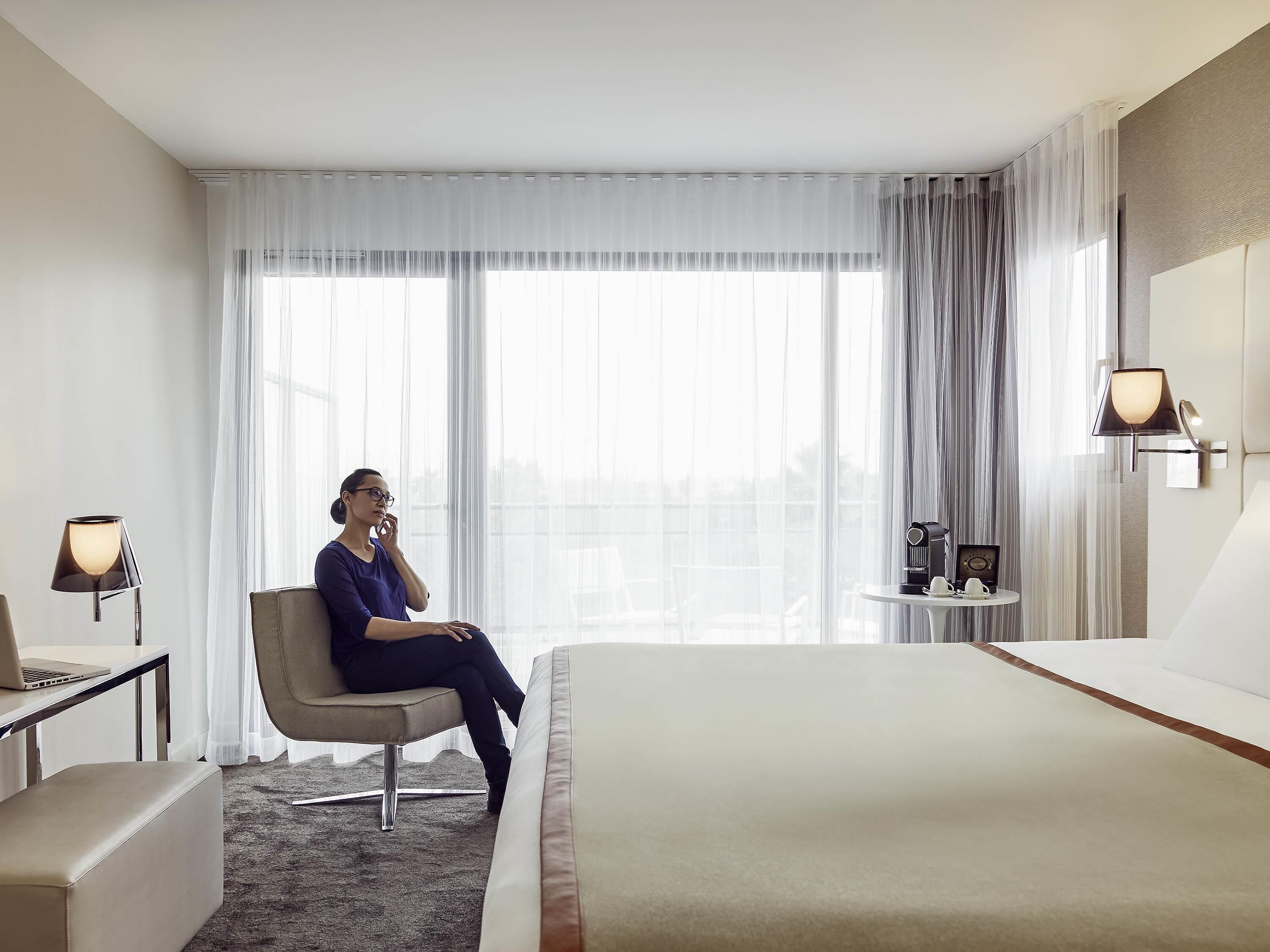 Premium bedding, pillow-top beds, free minibar items, in-room safe