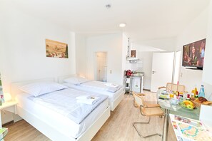 Apartamento | Roupas de cama premium, camas Select Comfort, cortinas blackout