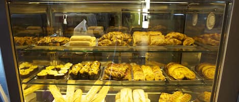 Breakfast, lunch, dinner served; local cuisine
