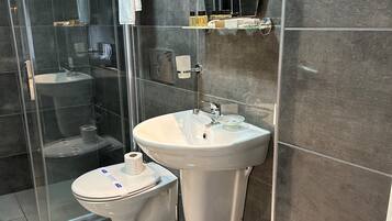 Shower, free toiletries, hair dryer, slippers
