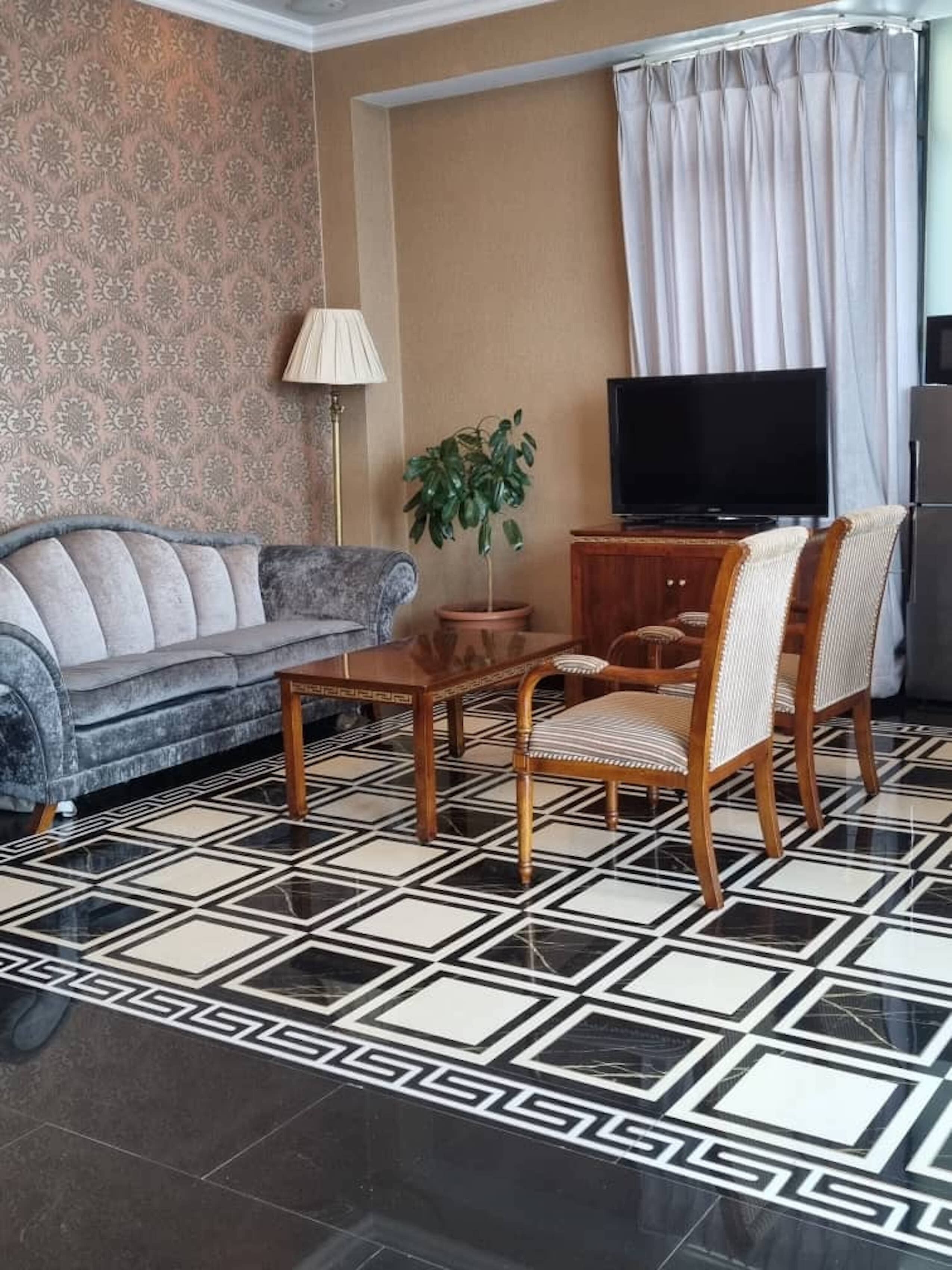 superior apartment | living area | 42-inch lcd tv with satellite channels, tv