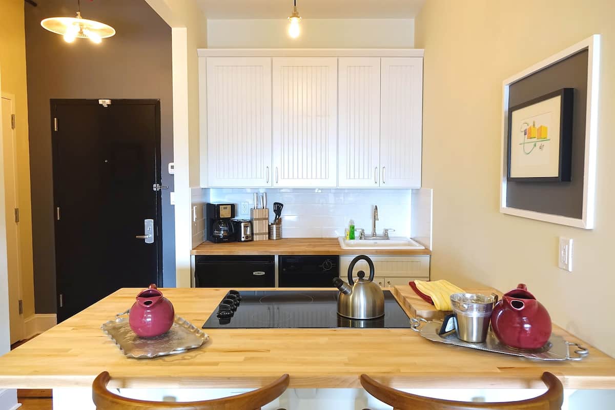 luxury penthouse, 2 bedrooms, balcony | private kitchen | fridge, coffee/tea maker, electric kettle, high chair