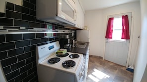 Kamar Double Deluks, 2 Tempat Tidur Double | Dapur pribadi | Lemari es, microwave, mesin pembuat kopi/teh, dan pemanggang roti