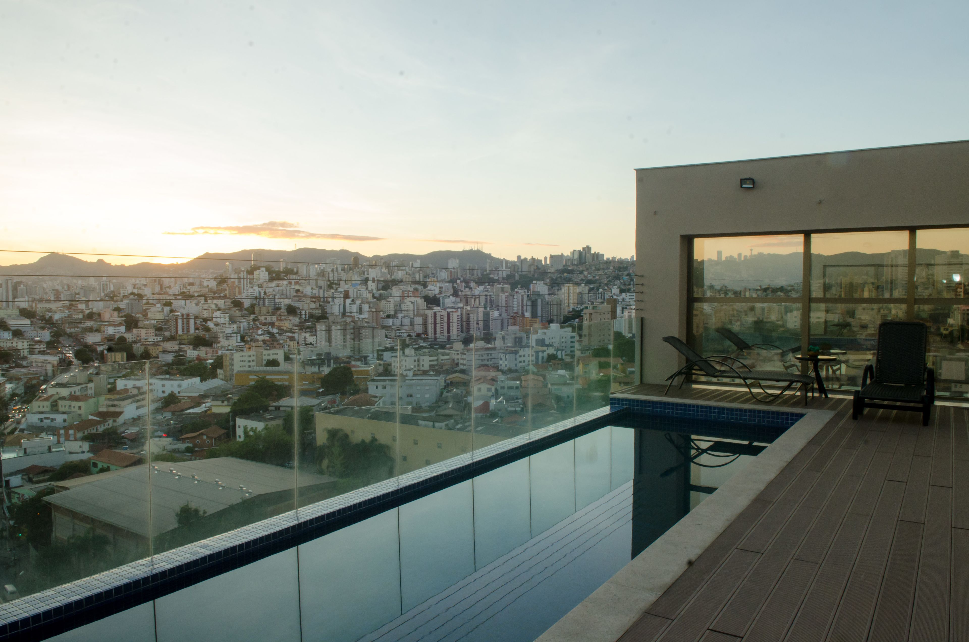 outdoor pool, open 8:00 am to 10:00 pm, pool loungers