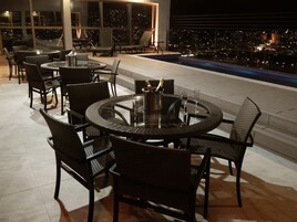 Outdoor pool, open 8:00 AM to 10:00 PM, sun loungers