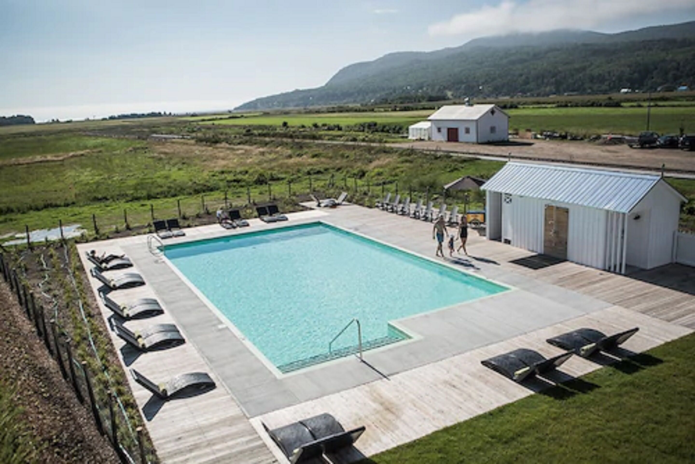 Seasonal outdoor pool, open 10:00 AM to 6:00 PM, pool loungers