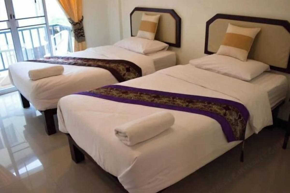 Desk, blackout drapes, WiFi (free), bed sheets