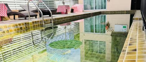 Outdoor pool, pool umbrellas, sun loungers