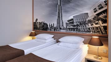 Family Room | Hypo-allergenic bedding, minibar, in-room safe, individually decorated