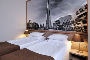 Chambre familiale | Literie hypoallergénique, minibar, coffre-fort, décor unique