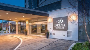 A hotel entrance with a sign reading "Delta Waterfront." - Delta Hotels by Marriott Waterloo (Waterloo)