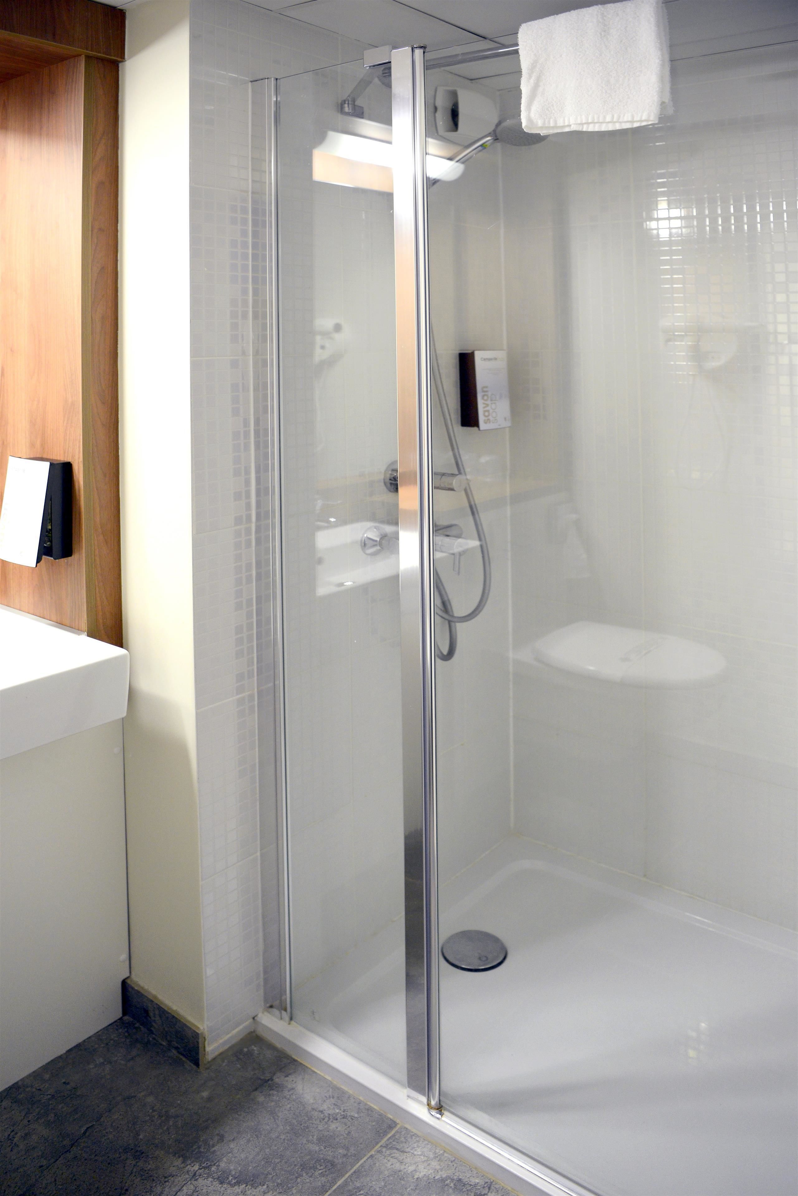 shower, eco-friendly toiletries, hair dryer, towels