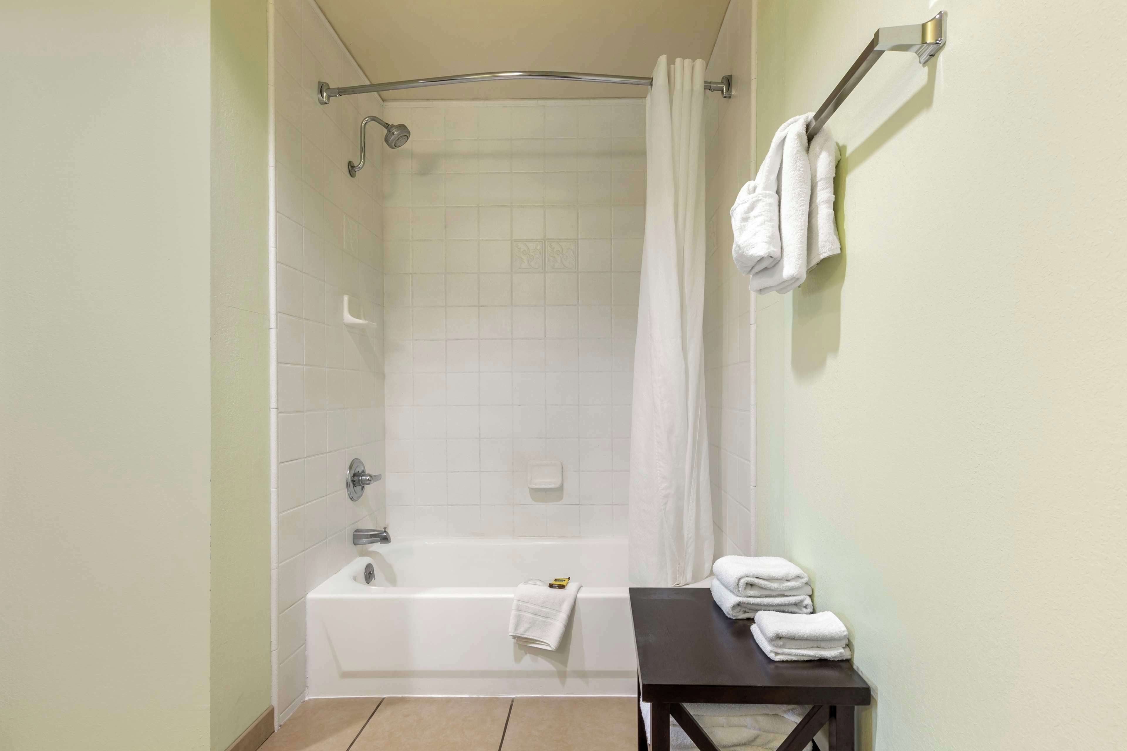 standard room, 1 king bed, non smoking, refrigerator & microwave (with sofabed) | bathroom | free toiletries, hair dryer, towels, soap