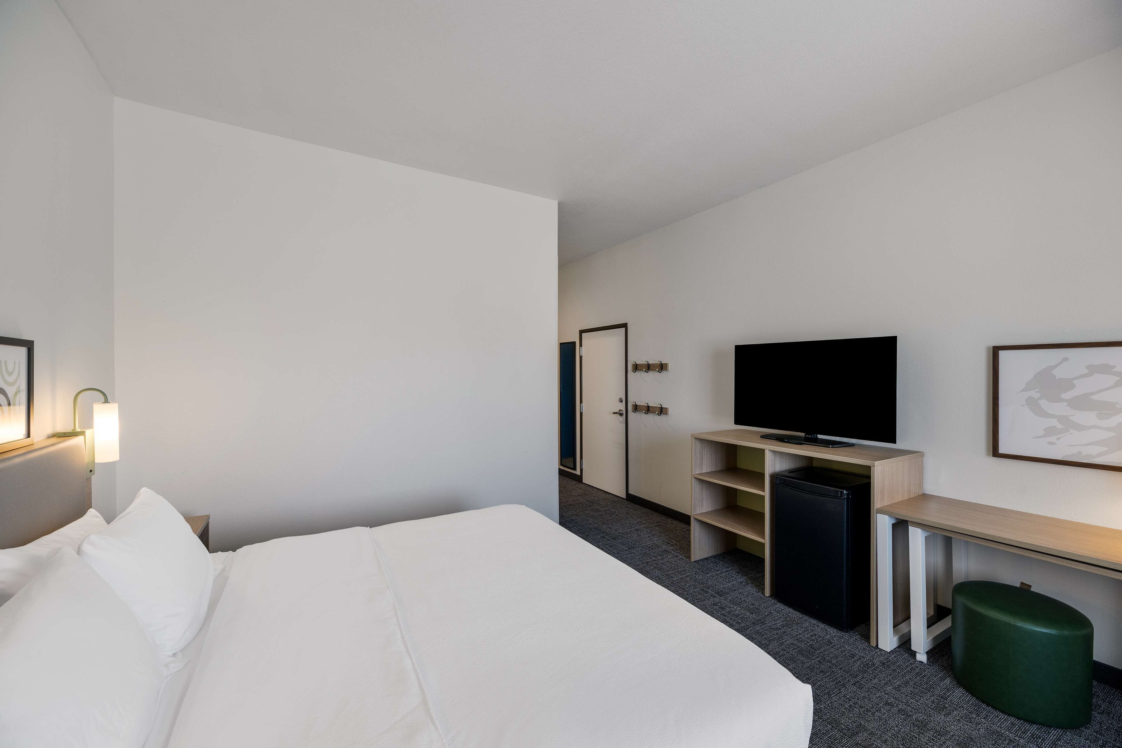 desk, laptop workspace, blackout curtains, iron/ironing board