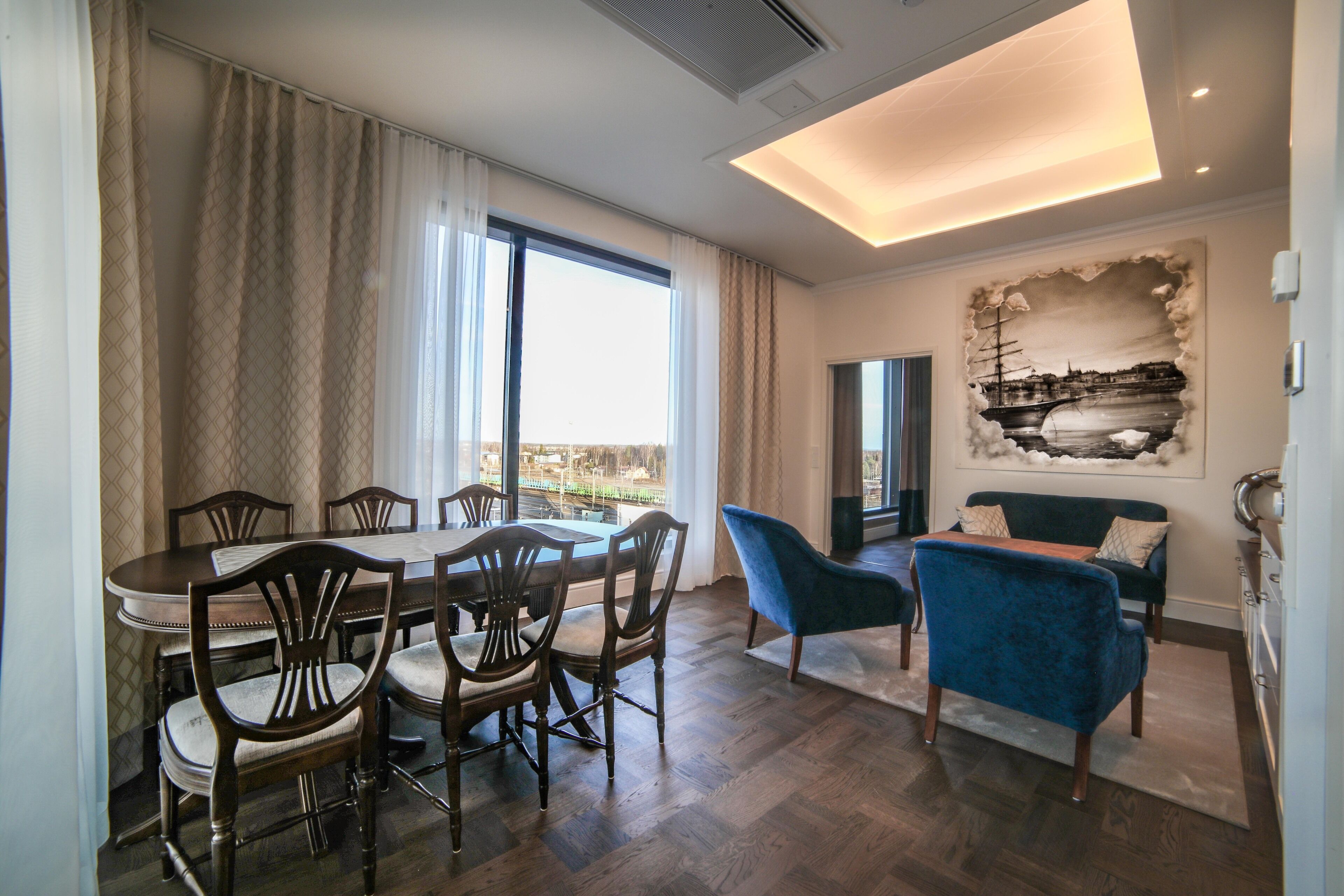 Executive Suite, 1 King Bed, Balcony, Jetted Tub, Sauna | Living room | Toys, heated floors