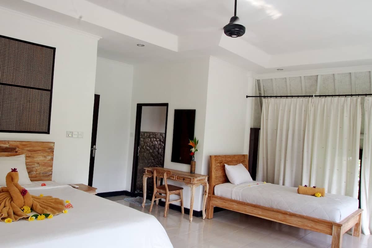 Family Suite | 1 bedroom, minibar, in-room safe, individually decorated