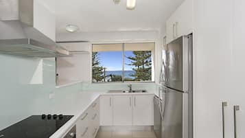 Aircon Apartment, 2 Bedrooms, Ocean View | Private kitchen | Full-size fridge, microwave, stovetop, dishwasher
