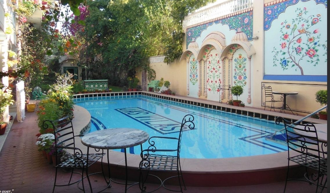 outdoor pool, pool loungers