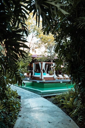 Outdoor pool, open 8:00 AM to 8:00 PM, free pool cabanas, pool umbrellas