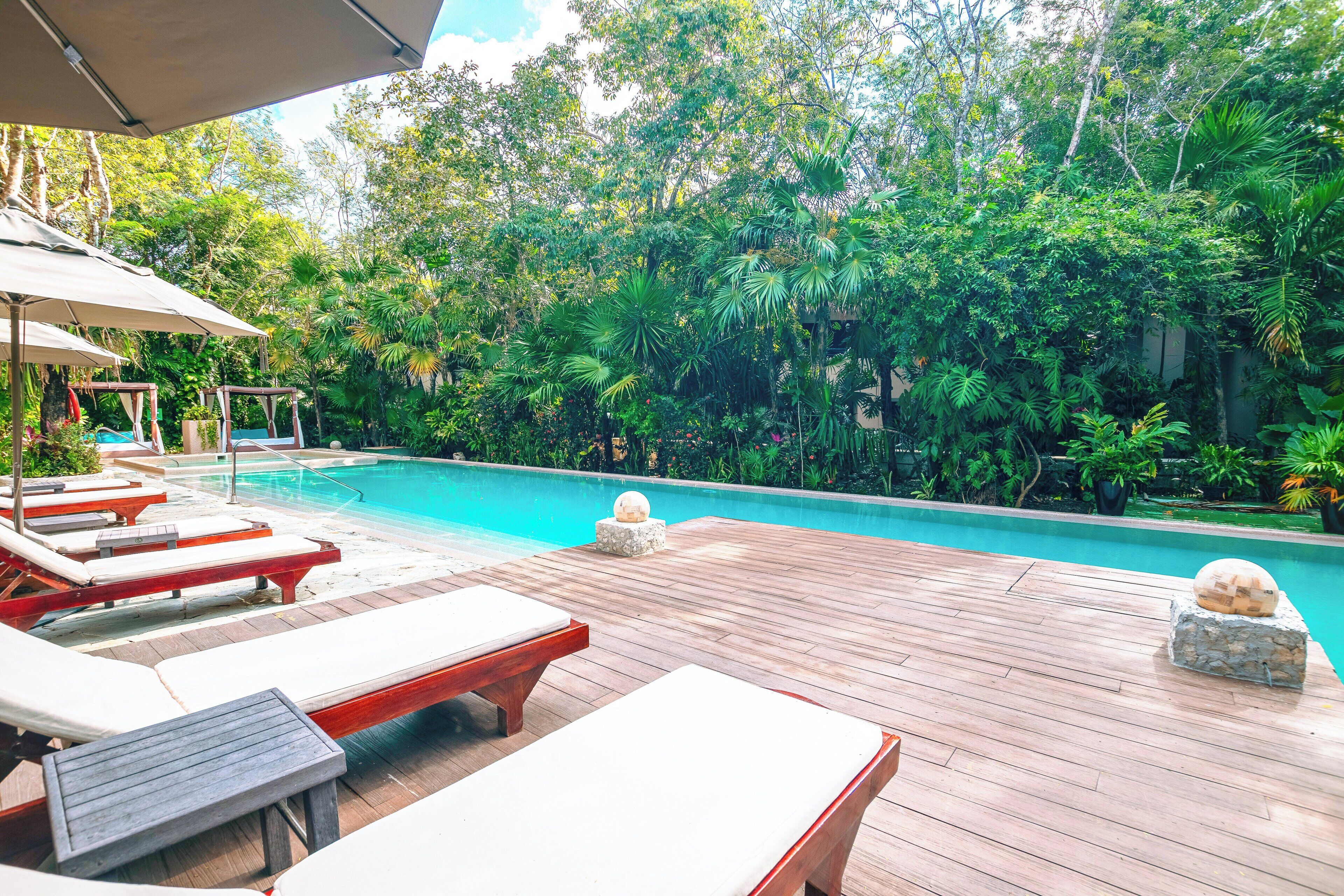 Outdoor pool, open 8:00 AM to 8:00 PM, free pool cabanas, pool umbrellas
