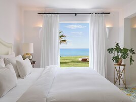 2 Bedroom Beach Villa Seafront | Minibar, in-room safe, individually decorated, blackout drapes
