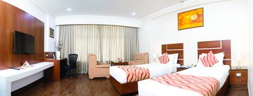 Ropa de cama de alta calidad y minibar 