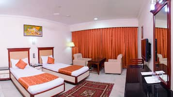 Executive Room | Premium bedding, minibar, in-room safe, individually decorated