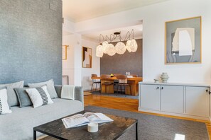 Deluxe Apartment, 2 Bedrooms | Living area | 37-inch flat-screen TV with digital channels