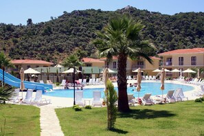 Seasonal outdoor pool, pool umbrellas, sun loungers