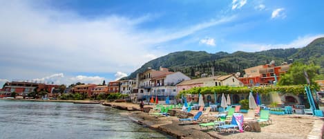 Beach nearby, white sand, sun-loungers, beach umbrellas