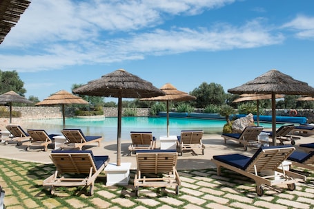 Indoor pool, outdoor pool, pool umbrellas, sun loungers