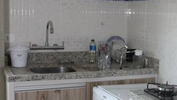 Microwave, stovetop, cookware/dishes/utensils