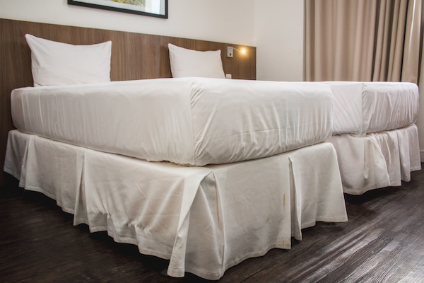 Quarto duplo superior | Frigobar, cofres nos quartos, escrivaninha, Wi-Fi de cortesia