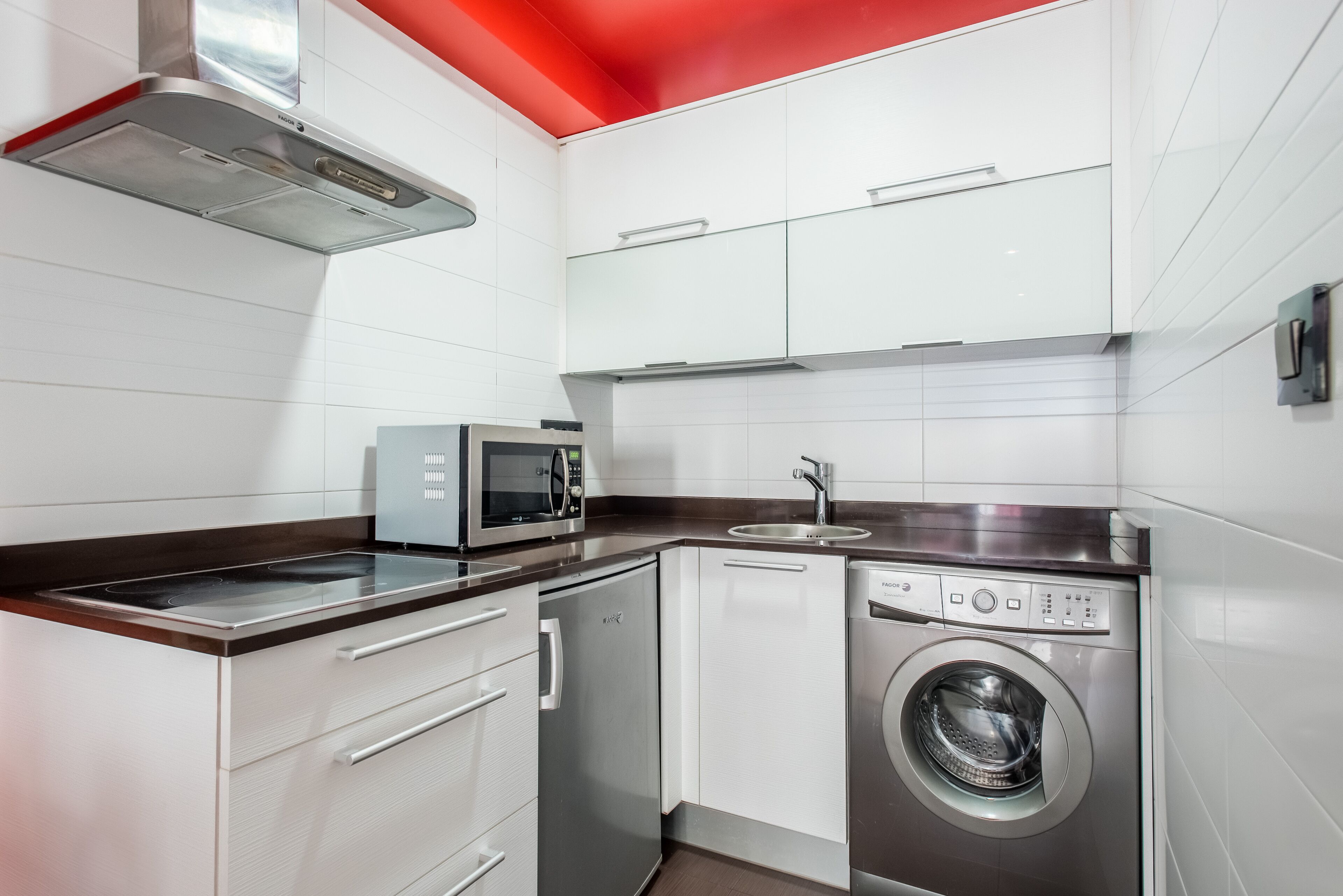 mini-fridge, microwave, stovetop, toaster