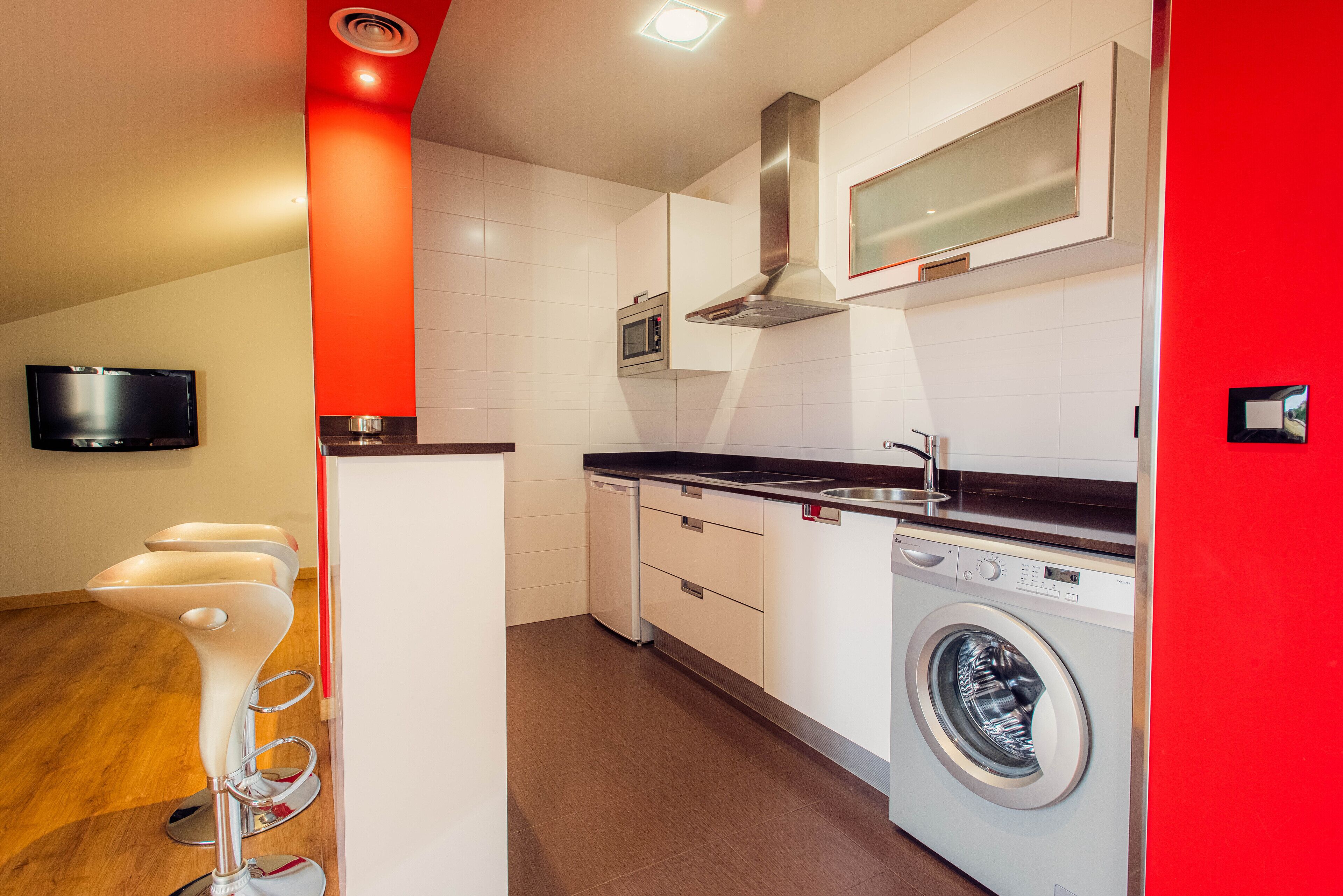 mini-fridge, microwave, stovetop, toaster